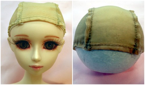 Pick up the wig cap and turn it inside out.