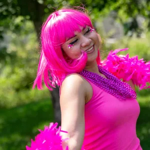 Person in cosplay with a pink bob wig