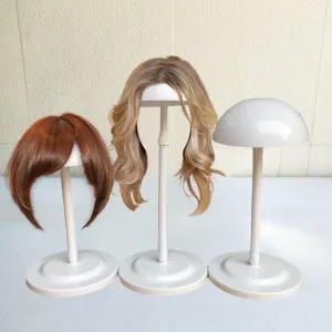 Show an image of a wig being styled on a stand.