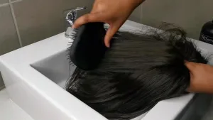 Step-by-step cleaning process for a wig with cap