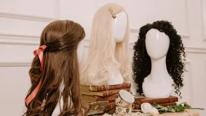 Comparison between synthetic and human hair wigs on mannequins