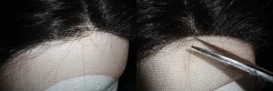 Close-up of a black lace front wig showing its natural hairline and texture