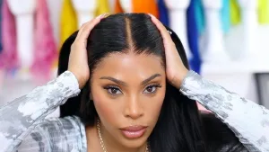 A model wearing a lace front wig, showing the natural hairline