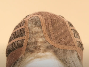 Illustration of a partial monofilament lace wig, showing the combination of monofilament caps and lace structure with a fine transparent mesh at the top.