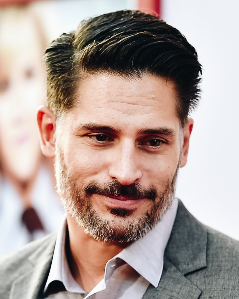 Close-up portrait of a man with a classic, polished hairstyle.